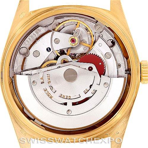 This image shows the internal mechanism and movement of a Rolex President 18078 Men
s Yellow Gold Champagne Dial 18078 Men
s Yellow Gold Champagne Dial model watch with its case back removed.