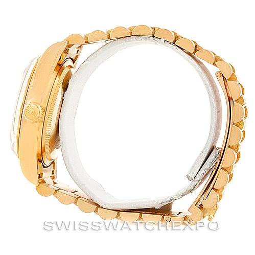 The image shows a side view of a Rolex President 18078 Men
s Yellow Gold Champagne Dial 18078 Men
s Yellow Gold Champagne Dial model, focusing on the case and bracelet.