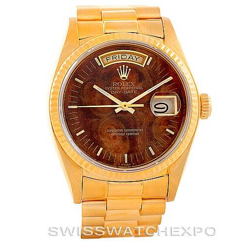 This image shows a front view of the Rolex President 18038 Men's Yellow Gold Brown Dial 18038 Men's Yellow Gold Brown Dial Day-Date watch, featuring the dial, bezel, and part of the bracelet.