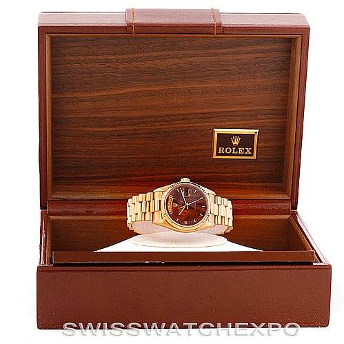 The image shows a Rolex President 18038 Men's Yellow Gold Brown Dial 18038 Men's Yellow Gold Brown Dial watch displayed in an open Rolex branded wooden box with a leather exterior.