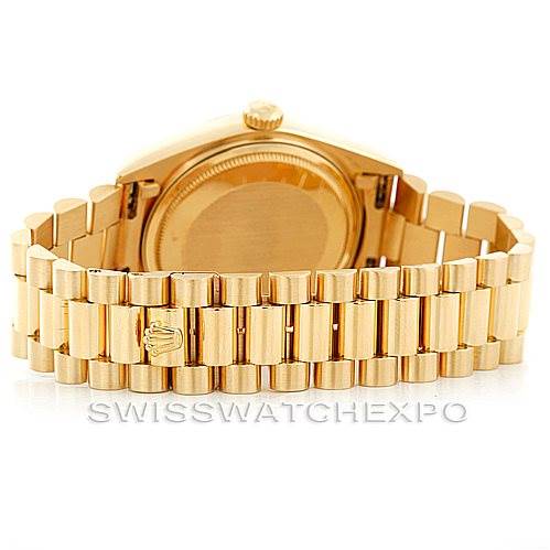 The image shows the back view of a Rolex President 18038 Men's Yellow Gold Brown Dial 18038 Men's Yellow Gold Brown Dial model watch, highlighting the case back, crown, and bracelet.