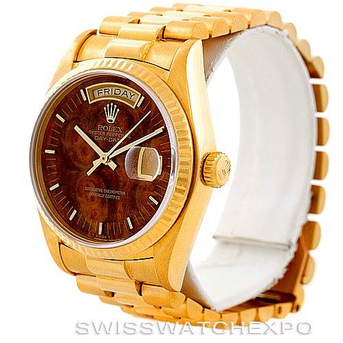 The image shows a Rolex President 18038 Men's Yellow Gold Brown Dial 18038 Men's Yellow Gold Brown Dial model watch from an oblique angle, with a focus on the face and bracelet.