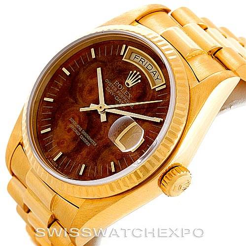 This image shows a Rolex President 18038 Men's Yellow Gold Brown Dial 18038 Men's Yellow Gold Brown Dial model watch from an angled view, highlighting the case, dial, crown, and part of the bracelet.