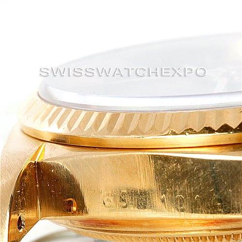 This image shows a close-up, side view of the bezel, case, and part of the crystal of a Rolex President 18038 Men's Yellow Gold Brown Dial 18038 Men's Yellow Gold Brown Dial model watch.