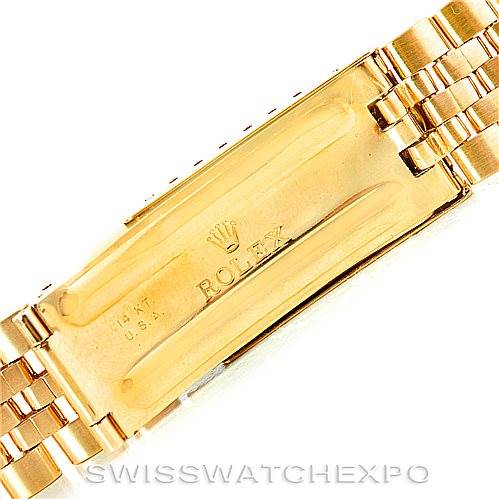 This image shows the clasp and part of the bracelet of a Rolex President 1503 Men
s Yellow Gold Champagne Dial 1503 Men
s Yellow Gold Champagne Dial model watch.
