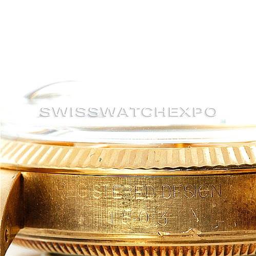 The image shows a close-up side view of a Rolex President 1503 Men
s Yellow Gold Champagne Dial 1503 Men
s Yellow Gold Champagne Dial watch case, focusing on the engraved design and model number 1503.