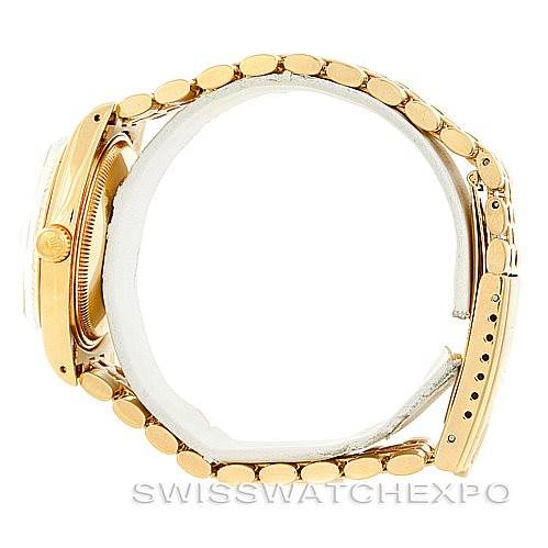 The image shows a side view of a Rolex President 1503 Men
s Yellow Gold Champagne Dial 1503 Men
s Yellow Gold Champagne Dial model watch, displaying its band and crown.