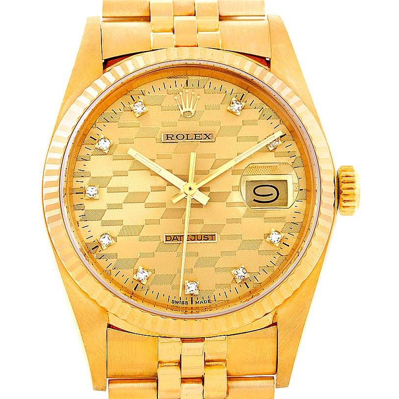 This image shows the face and top part of the bracelet of a Rolex President 16018 Men's Yellow Gold Champagne Dial 16018 Men's Yellow Gold Champagne Dial model watch, highlighting the gold dial and diamond hour markers.