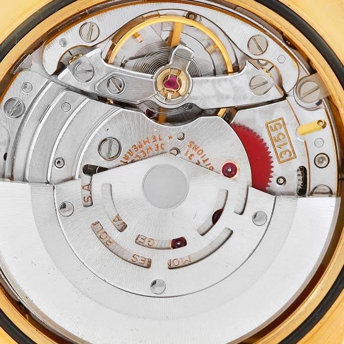 This image showcases the intricate movement mechanism of the Rolex President 18248 Men's Yellow Gold Champagne Dial 18248 Men's Yellow Gold Champagne Dial model watch from an angled close-up view.