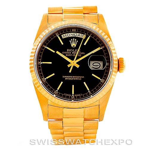 The image shows a front view of a Rolex President 18038 Men's Yellow Gold Black Dial 18038 Men's Yellow Gold Black Dial watch with a gold band and black dial displaying the day and date.