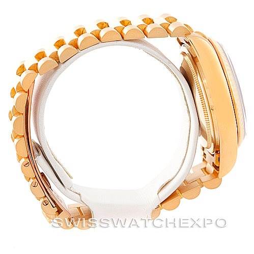 This image shows a side view of a Rolex President 18038 Men's Yellow Gold Black Dial 18038 Men's Yellow Gold Black Dial model watch, highlighting its band and case.