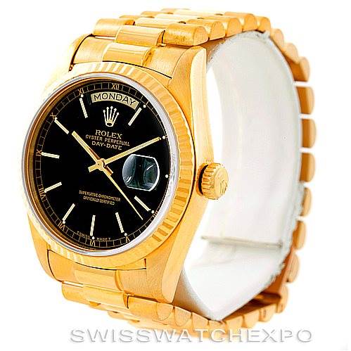 The image shows a Rolex President 18038 Men's Yellow Gold Black Dial 18038 Men's Yellow Gold Black Dial model watch angled to display the face, bezel, case, crown, and part of the bracelet.