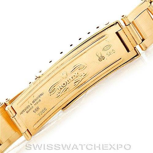 This image shows the clasp and part of the band of a Rolex President 1503 Men
s Yellow Gold Champagne Dial 1503 Men
s Yellow Gold Champagne Dial model, highlighting hallmarks and inscriptions.
