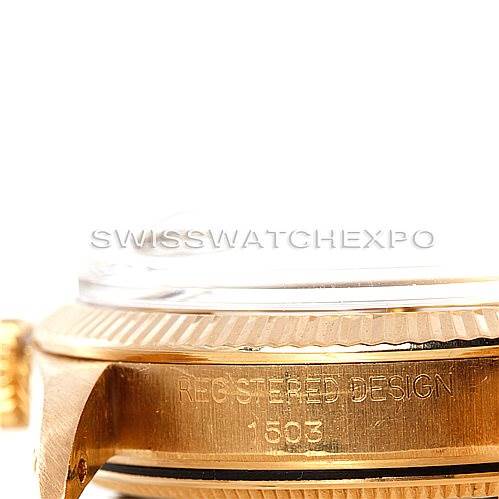 The image shows a close-up side view of the Rolex President 1503 Men
s Yellow Gold Champagne Dial 1503 Men
s Yellow Gold Champagne Dial model watch, highlighting the bezel and case with the registered design number 1803.
