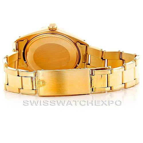The image shows the back view of a Rolex President 1503 Men
s Yellow Gold Champagne Dial 1503 Men
s Yellow Gold Champagne Dial model, including the case back, bracelet, and clasp.