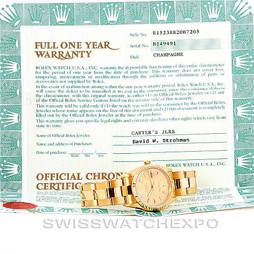 The image shows a full view of a Rolex President 15238 Men
s Yellow Gold Champagne Dial 15238 Men
s Yellow Gold Champagne Dial model watch along with its official warranty and chronometer certification documents.