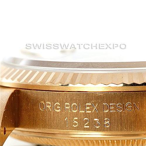 This image shows a close-up side view of the Rolex President 15238 Men
s Yellow Gold Champagne Dial 15238 Men
s Yellow Gold Champagne Dial watch, focusing on the engraved model number and "Orig Rolex Design" text.