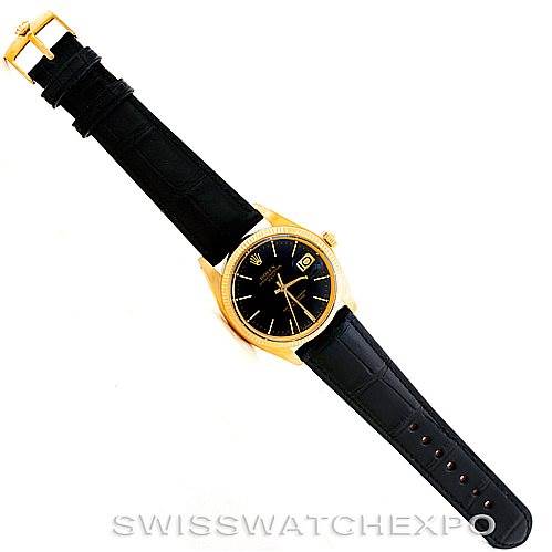 The image shows a Rolex President 1503 Men's Yellow Gold Black Dial 1503 Men's Yellow Gold Black Dial model watch from a top-down angle, revealing the face, bezel, crown, and leather strap.