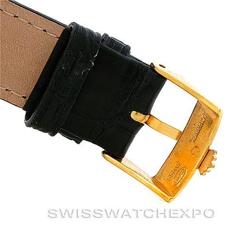 This image shows the gold buckle and black leather strap of a Rolex President 1503 Men's Yellow Gold Black Dial 1503 Men's Yellow Gold Black Dial model watch.