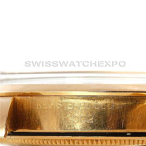 This image shows the side view of a Rolex President 1002 Men's Steel and Gold (two tone) Black Dial 1002 Men's Steel and Gold (two tone) Black Dial model watch, focusing on the engraved registered design number.