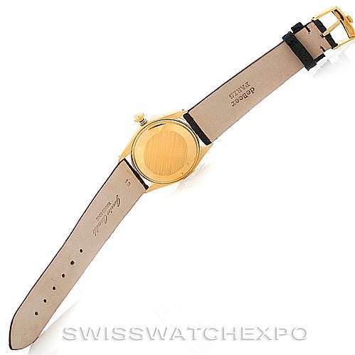 This image shows the back of a Rolex President 1002 Men's Steel and Gold (two tone) Black Dial 1002 Men's Steel and Gold (two tone) Black Dial model watch, including its case and leather strap.