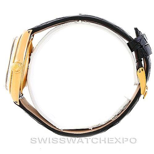 The Rolex President 1002 Men's Steel and Gold (two tone) Black Dial 1002 Men's Steel and Gold (two tone) Black Dial model watch is shown from a side view, highlighting the crown, case, and leather strap.