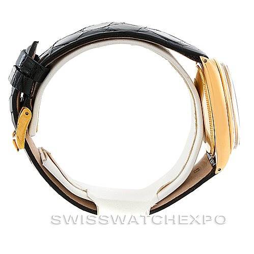 This image shows a side profile of the Rolex President 1002 Men's Steel and Gold (two tone) Black Dial 1002 Men's Steel and Gold (two tone) Black Dial watch, highlighting the leather strap and gold casing.