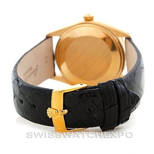 This image shows the back view of a Rolex President 1002 Men's Steel and Gold (two tone) Black Dial 1002 Men's Steel and Gold (two tone) Black Dial model watch, including the clasp and leather strap.