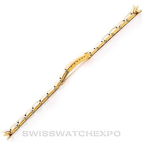The image shows a gold bracelet of the Rolex President Men's  Men's  model, photographed from a top-down angle.