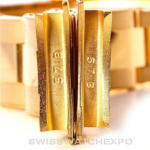This close-up image shows the clasp of a Rolex President Men's  Men's  model watch, highlighting the "57B" engravings.