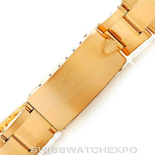 The image shows a close-up view of the clasp and bracelet of a Rolex President Men's  Men's  model watch.