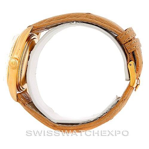 The image shows a side profile of the Rolex President 1803 Men
s Yellow Gold Silver Dial 1803 Men
s Yellow Gold Silver Dial model watch with a gold case and brown leather strap.