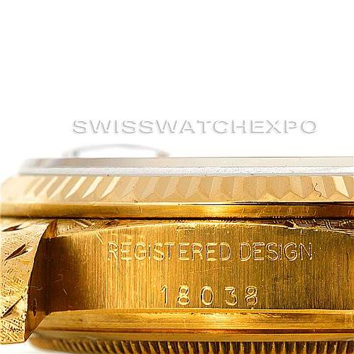 The image shows a side view of the Rolex President 18038 Men
s Yellow Gold Silver Dial 18038 Men
s Yellow Gold Silver Dial model watch casing, highlighting the "REGISTERED DESIGN 18038" engravings.