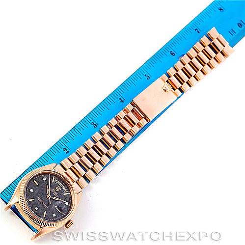 The image shows a Rolex President 1803 Men
s Rose Gold Black Dial 1803 Men
s Rose Gold Black Dial model watch laid flat next to a ruler, displaying the watch face and bracelet in full.