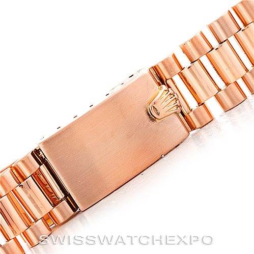 This image shows a close-up of the clasp and bracelet of a Rolex President 1803 Men
s Rose Gold Black Dial 1803 Men
s Rose Gold Black Dial model watch.