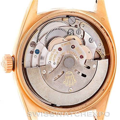 This image shows the movement and inner mechanics of the Rolex President 1803 Men
s Rose Gold Black Dial 1803 Men
s Rose Gold Black Dial model watch from a back or caseback angle.