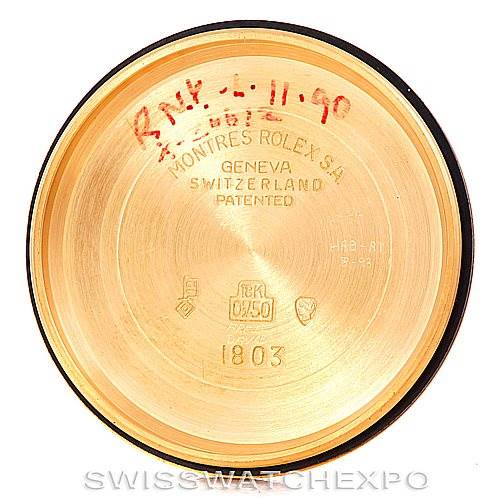 This is the inner case back of a Rolex President 1803 Men
s Yellow Gold Champagne Dial 1803 Men
s Yellow Gold Champagne Dial model watch, displaying official engravings and markings.