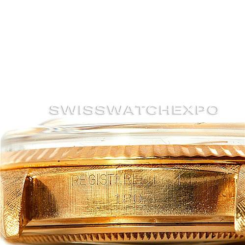 This image shows a close-up of the side engraving on a Rolex President 1803 Men
s Yellow Gold Champagne Dial 1803 Men
s Yellow Gold Champagne Dial model watch case.