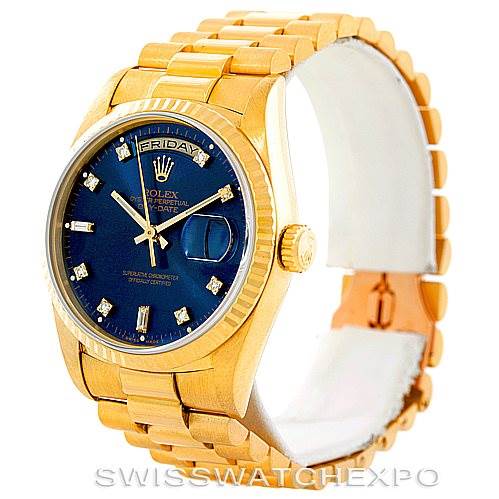 The Rolex President 18238 Men's Yellow Gold Blue Dial 18238 Men's Yellow Gold Blue Dial model watch is shown at a slight side angle, highlighting the gold bracelet, blue dial, and diamond hour markers.