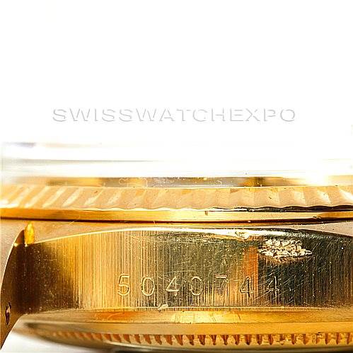 The image shows a close-up side view of the Rolex President 1803 Men
s Yellow Gold Silver Dial 1803 Men
s Yellow Gold Silver Dial model case side, revealing the serial number engraving.