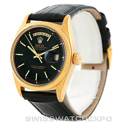 The image shows a Rolex President 1803 Men's Yellow Gold Black Dial 1803 Men's Yellow Gold Black Dial model watch at an angle displaying the face, bezel, crown, and part of the strap.