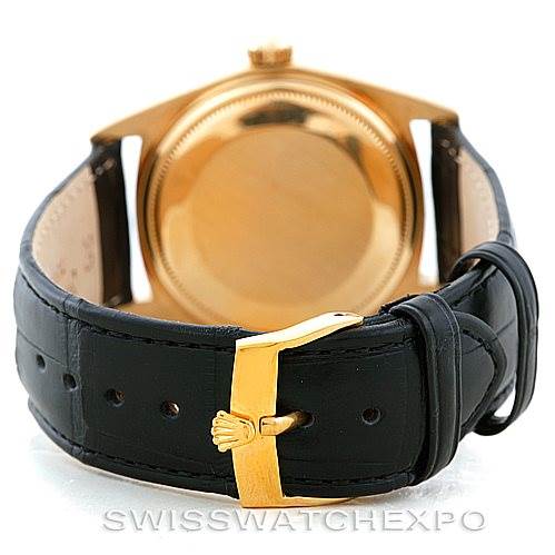 The image shows the back case and clasp of a Rolex President 1803 Men's Yellow Gold Black Dial 1803 Men's Yellow Gold Black Dial model watch.