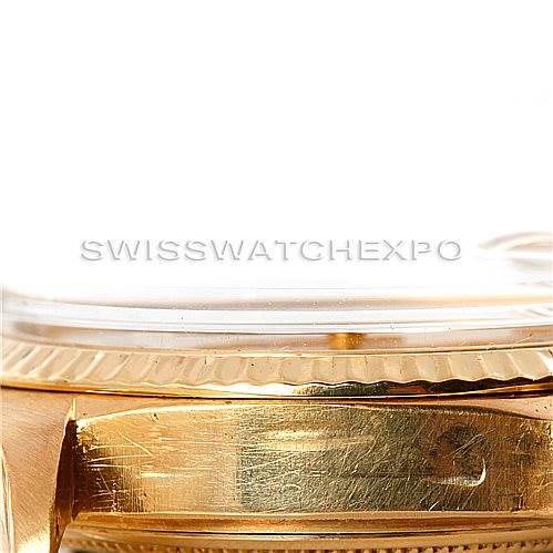 This close-up image shows the side of the gold case and bezel of a Rolex President 1803 Men
s Yellow Gold Champagne Dial 1803 Men
s Yellow Gold Champagne Dial model watch.