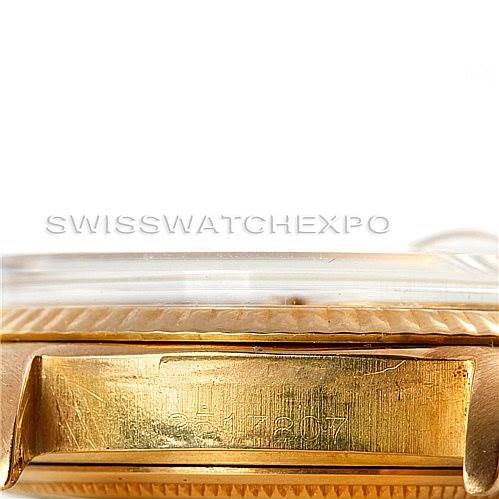 This image shows a close-up view of a Rolex President 1803 Men
s Yellow Gold Silver Dial 1803 Men
s Yellow Gold Silver Dial model watch case, focusing on the serial number engraving on the side.