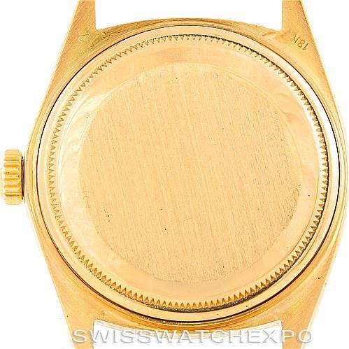 This is the back case view of a Rolex President 1803 Men
s Yellow Gold Silver Dial 1803 Men
s Yellow Gold Silver Dial model watch, showing the screw-down case back and crown.