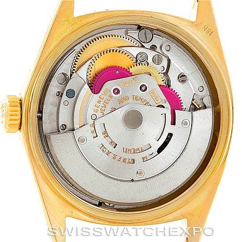 This image shows the back view of the Rolex President 1803 Men
s Yellow Gold Silver Dial 1803 Men
s Yellow Gold Silver Dial model, revealing its intricate movement and internal components.