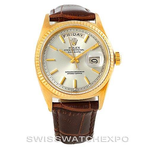 The Rolex President 1803 Men
s Yellow Gold Silver Dial 1803 Men
s Yellow Gold Silver Dial watch model is shown from a front angle, featuring its gold case, day-date display, and a brown leather strap.
