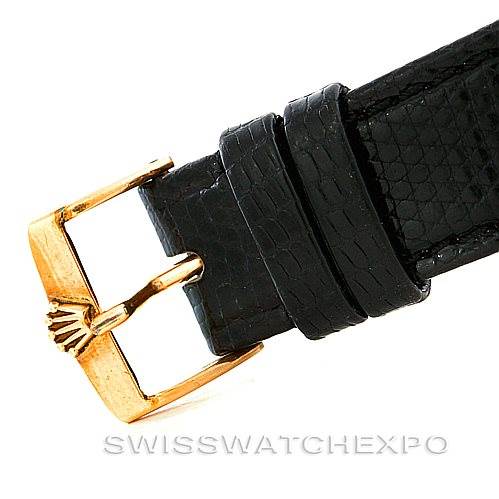 This image shows the clasp and part of the leather strap for a Rolex President 1803 Men
s Yellow Gold Silver Dial 1803 Men
s Yellow Gold Silver Dial model watch.