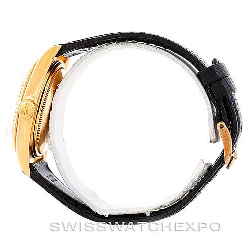 This is a side view of a Rolex President 1803 Men
s Yellow Gold Silver Dial 1803 Men
s Yellow Gold Silver Dial model watch, showing the case, crown, and leather strap with a buckle.