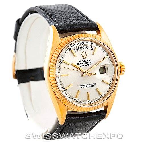 The image shows a frontal view of a Rolex President 1803 Men
s Yellow Gold Silver Dial 1803 Men
s Yellow Gold Silver Dial model watch with a gold case, white dial, black leather strap, and day-date feature.